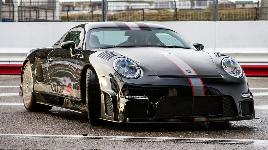 Тюнинговый Porsche мощность 1400 л.с. и макс. крутящим моментом 1160 Нм. Двигатель 3,6 л. Разгон 0-100 км/час за 3,1 сек. Макс. скорость 400 км/ч.